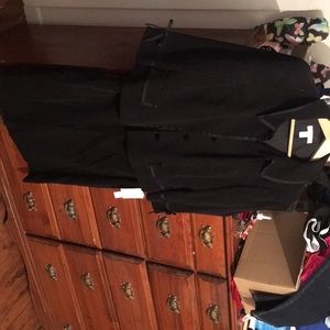 Black sparkling matching jacket and skirt.